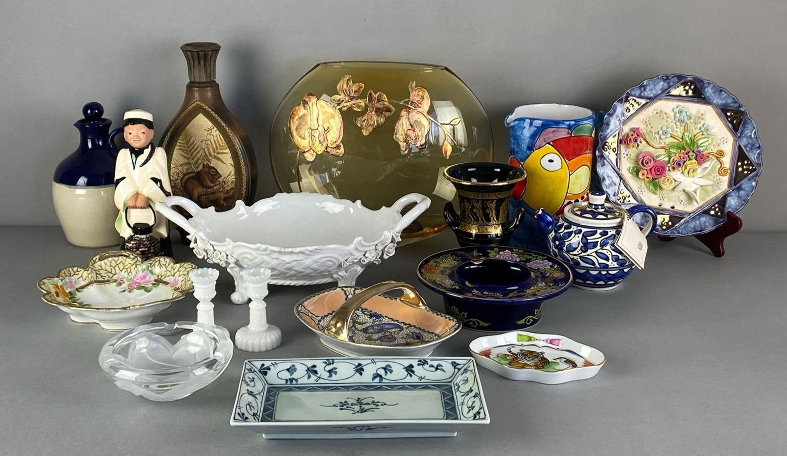 Group of Assorted Glass and Porcelain Items: Inclufes vases, bowls, candlesticks and more, largest measures 10” H x 12” W x 6” D