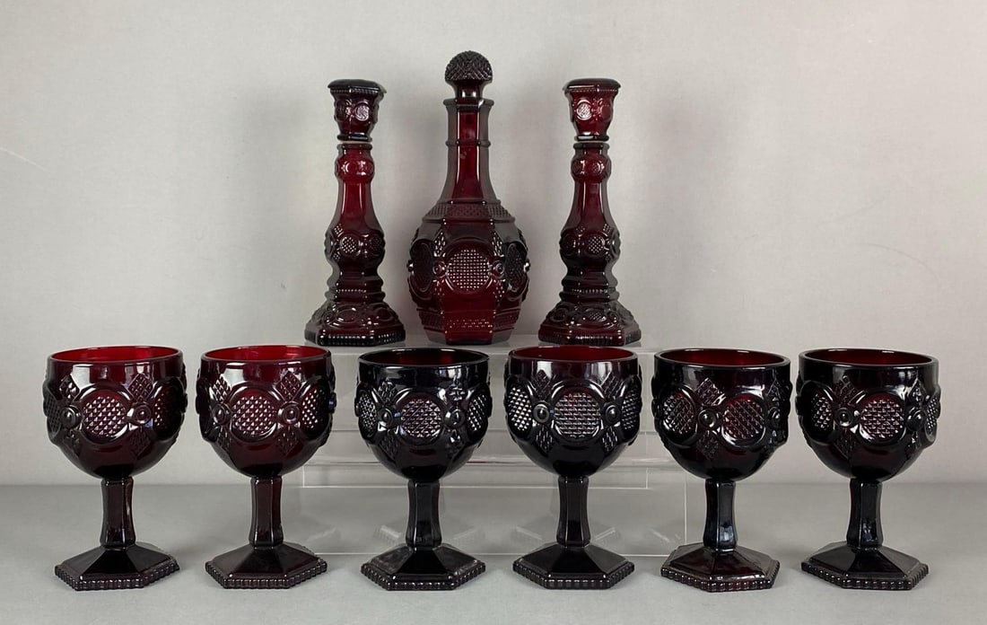 Group of AVON Pressed Ruby Glass Goblets and More: Includes decanter and candlesticks/decanters, all marked on base, largest measures 9 1/2” H