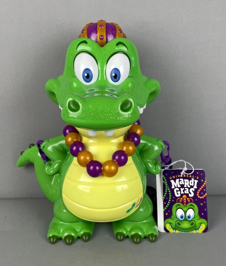 Universal Studios Mardi Gras Battery Operated Snack Crocodile: Like new, 30th anniversary, 11 1/2"