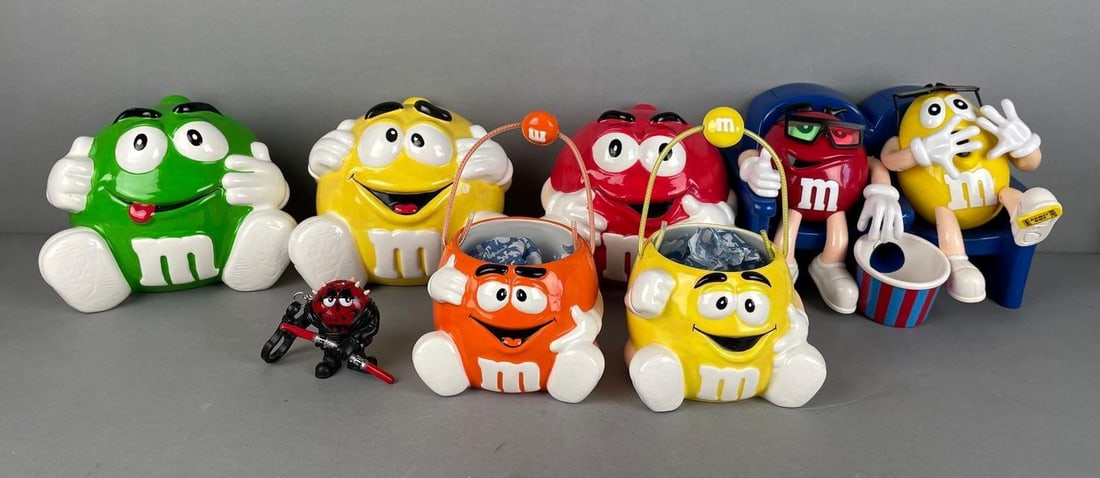 Group of M and Ms Cookie Jars and More: Movie dispenser measures 6 1/2" x 9" x 7"