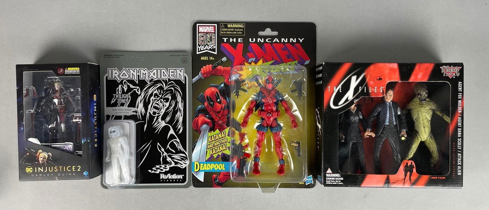 Group of Assorted Action Figures: Includes Deadpool, x-files, Iron Maiden Eddie, Harley Quinn