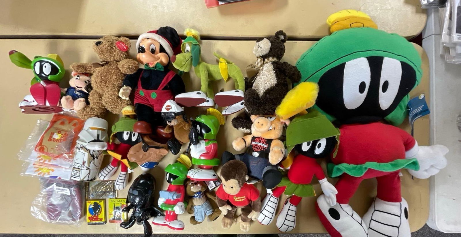Group of Cartoon Plushies and More: Includes Christmas Mickey Mouse, Batman trading cards, Harley Davidson, Marvin the Martian measures 35"