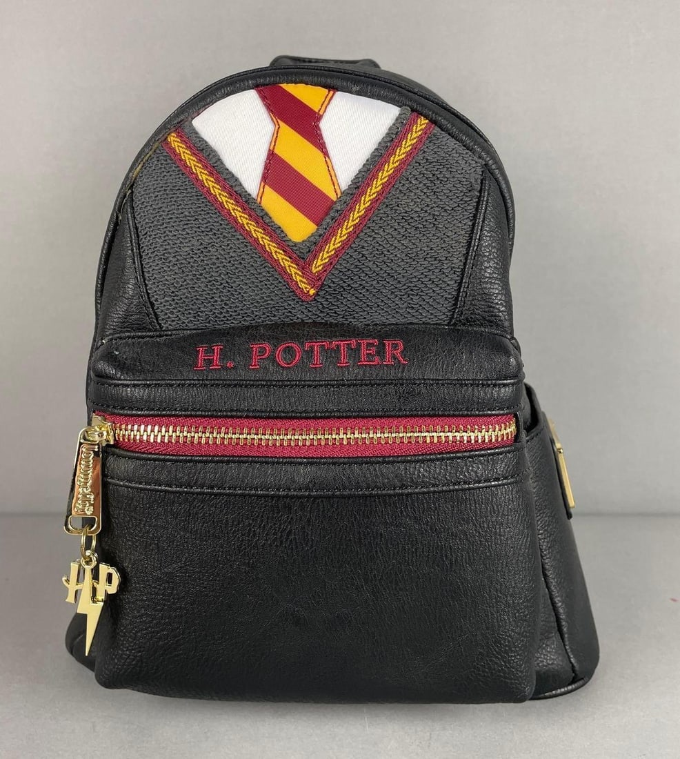 Loungefly Harry Potter Mini Backpack: Gryffindor, measures 10 1/2" x 9" x 6"