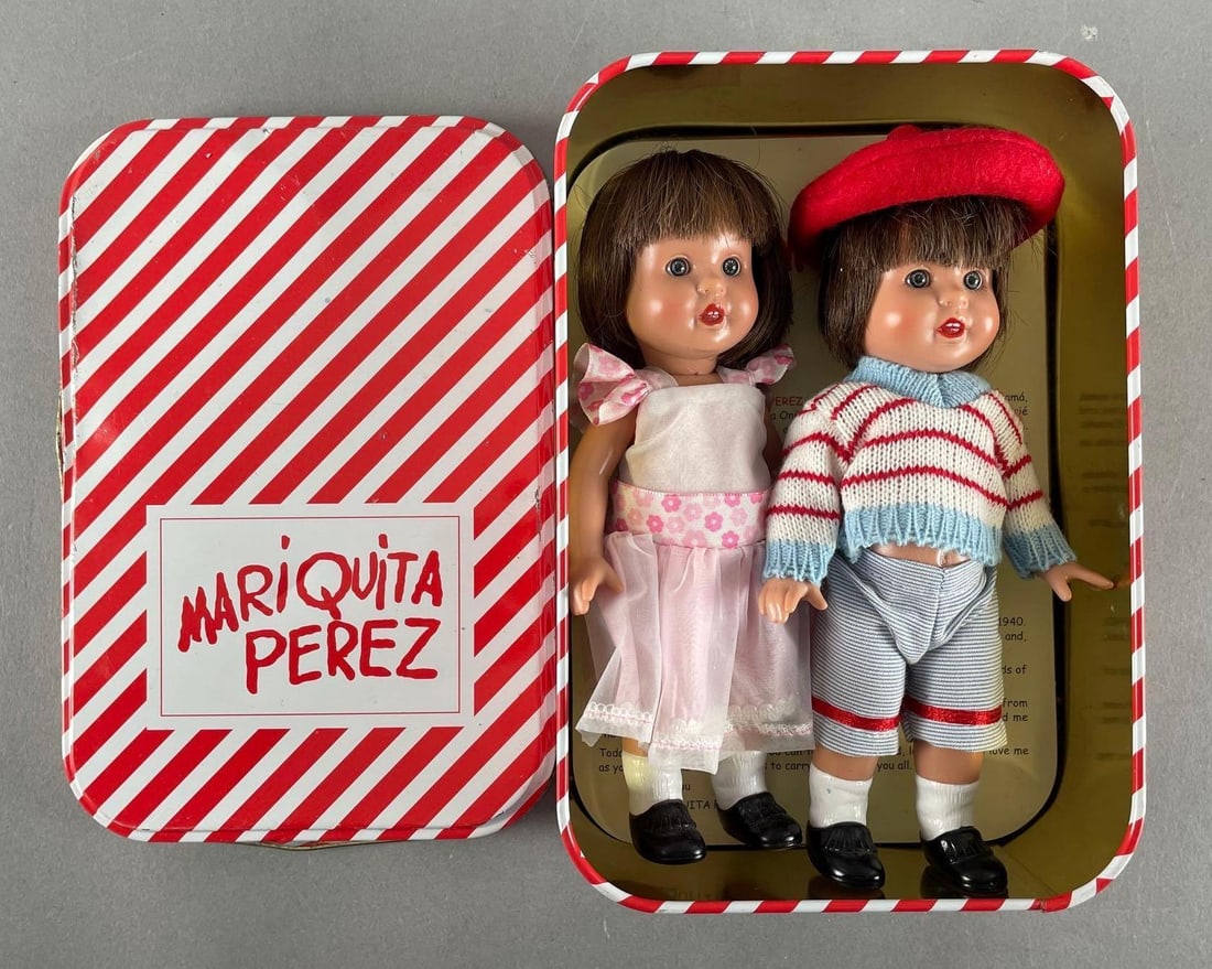 Group of 2 NP Mariquita Perez Dolls: 7 1/4", original tin measures 9" x 6 1/4" x 3"