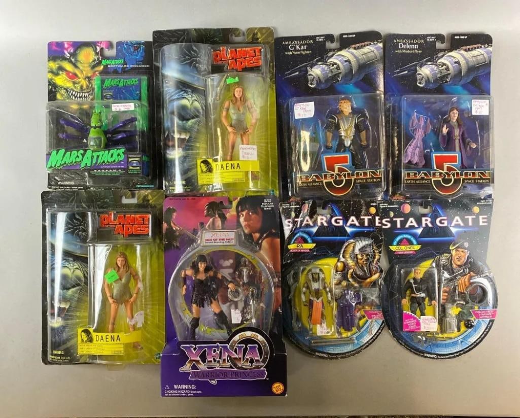 Group of 8 Film Action Figures: Includes Mars Attacks, Xena and more. Largest measures H12 1/2 x W8 x D2 3/4 inches