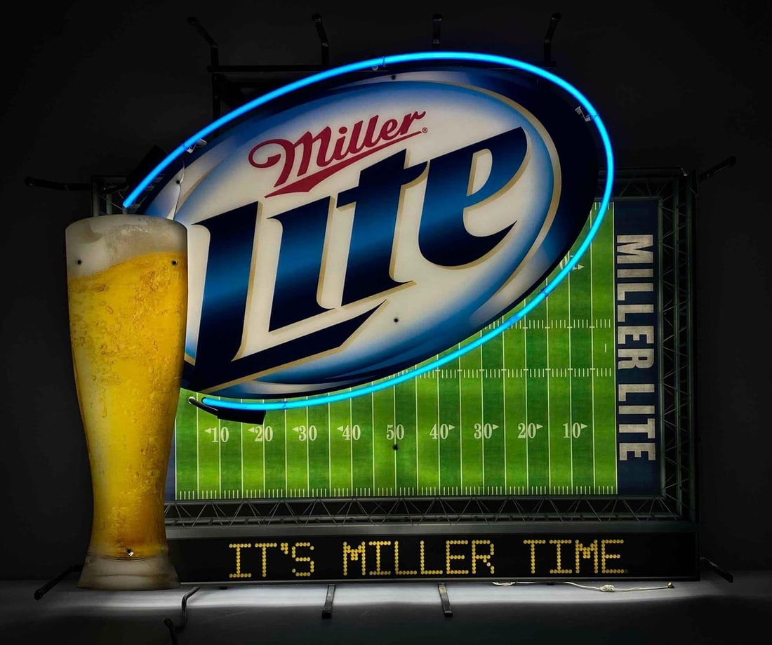 Miller Light Football Field Light Up Neon Advertising Sign: NO IN HOUSE SHIPPING AVAILABLE, THIRD PARTY SHIPPING RECOMMENDED, In working condition, crack on foreground and background panel on top right corner, measures 30” H x 34” W x 10” D