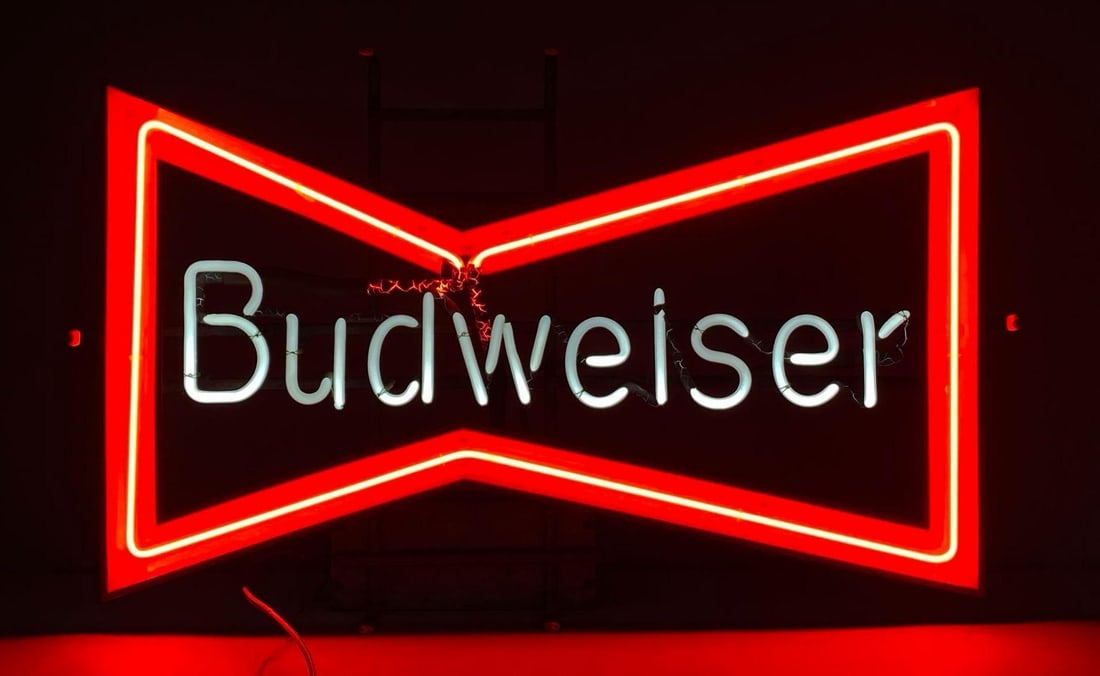 Budweiser Bowtie Light Up Neon Advertising Sign: NO IN HOUSE SHIPPING AVAILABLE, THIRD PARTY SHIPPING RECOMMENDED, In working condition, measures 19” H x 30” W x 7” D