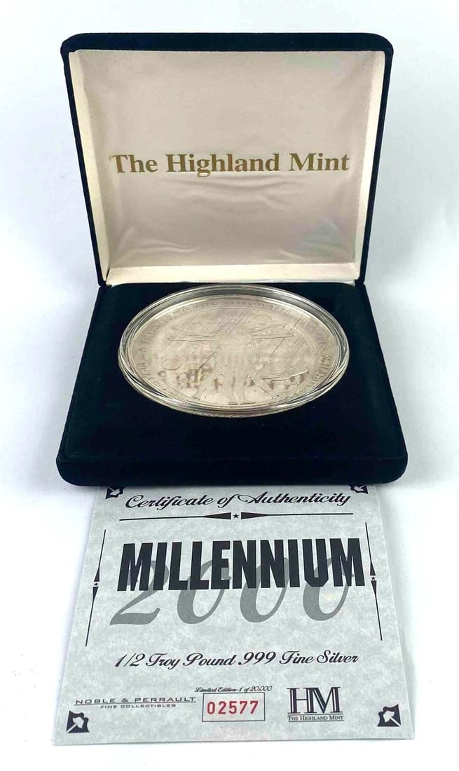 2000 The Highland Mint Millennium 1/2 LB .999 Fine Silver Round: 2000 The Highland Mint Millennium 1/2 LB .999 Fine Silver Round with COA.