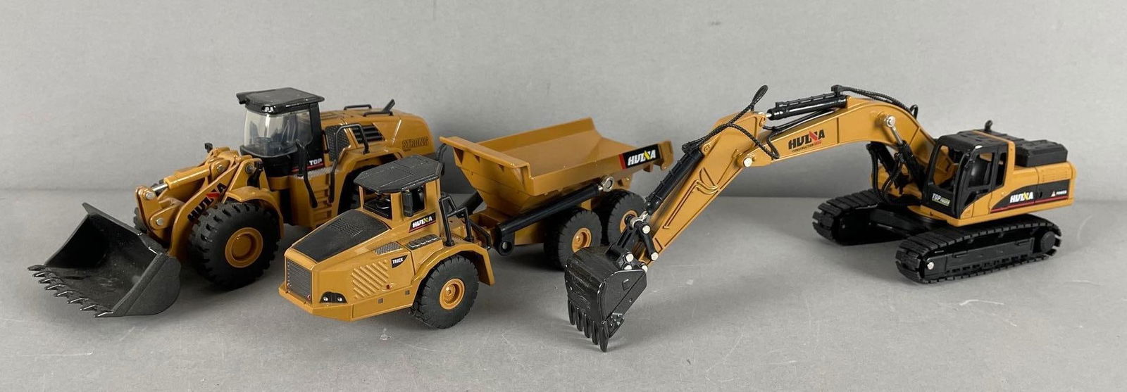 Group of Hulna Strong Power Die-Cast Earth Movers: 1/50 scale