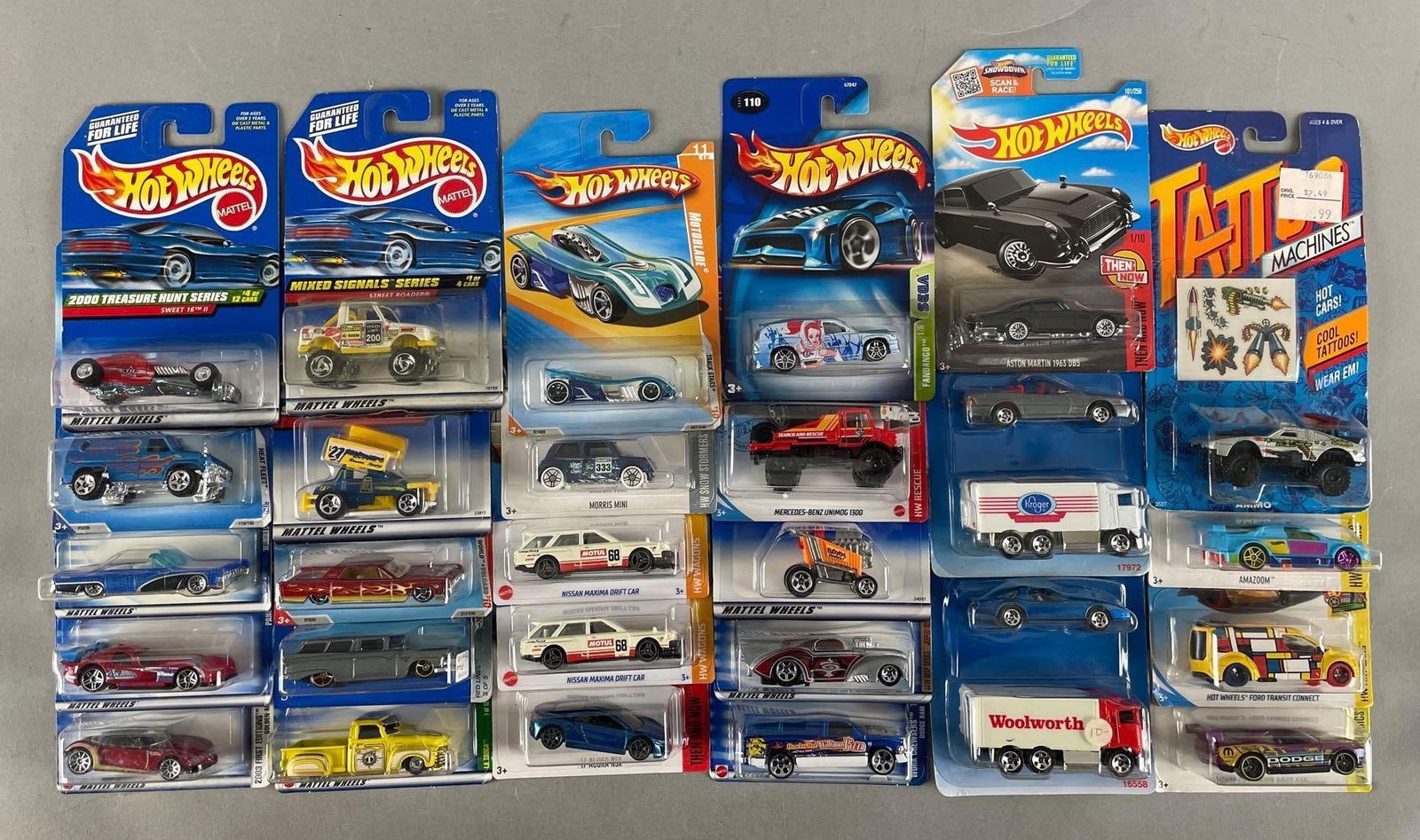Group of Mattel Hot Wheels Die-Cast Vehicles: Includes tattoo machines, slideout, volcano