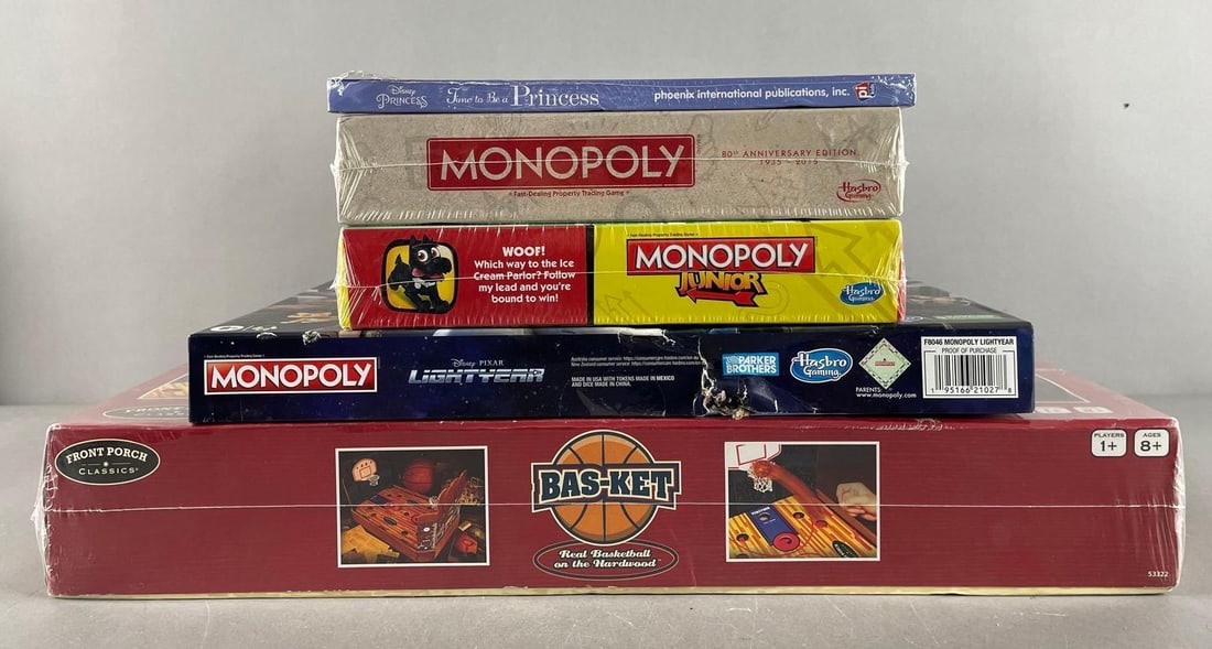 Group of Monopoly Board Games and More: Includes bas-ket, Disney princess interactive book, largest measures 14" x 21 1/4" x 3 1/2"