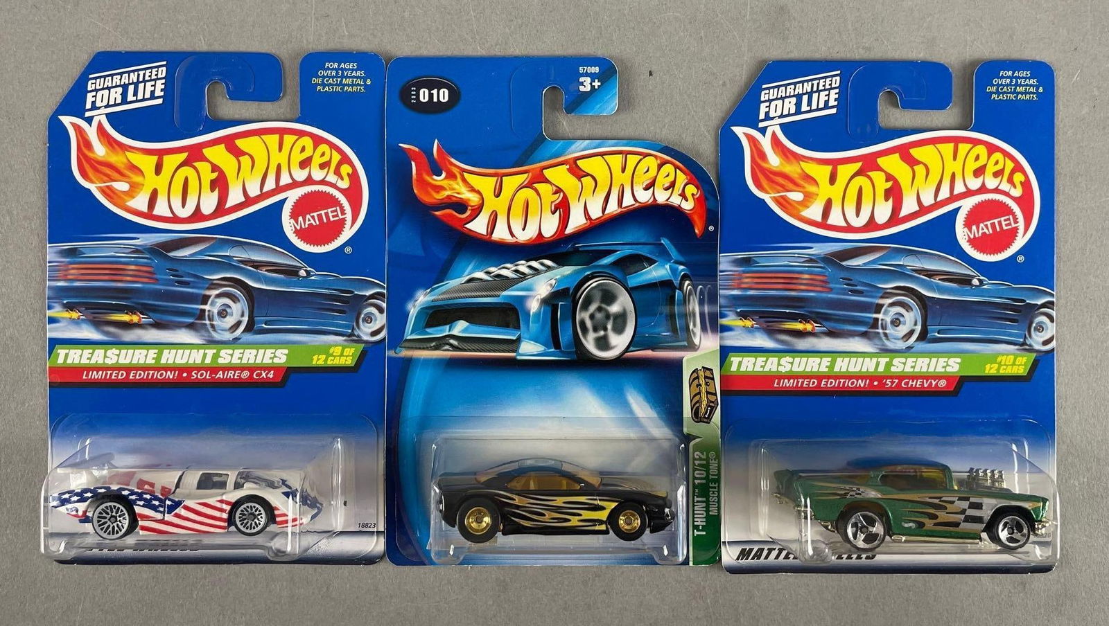Group of 3 Mattel Hot Wheels Treasure Hunt Die-Cast Vehicles: Includes LE sol-aire, 57 Chevy, muscle tone