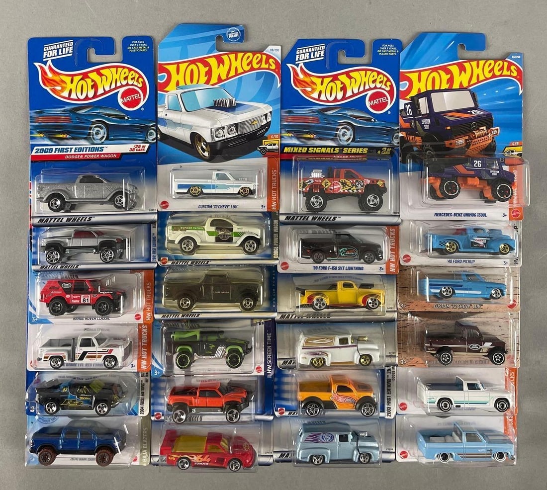 Group of Mattel Hot Wheels Die-Cast Trucks: Includes'40 ford, range rover