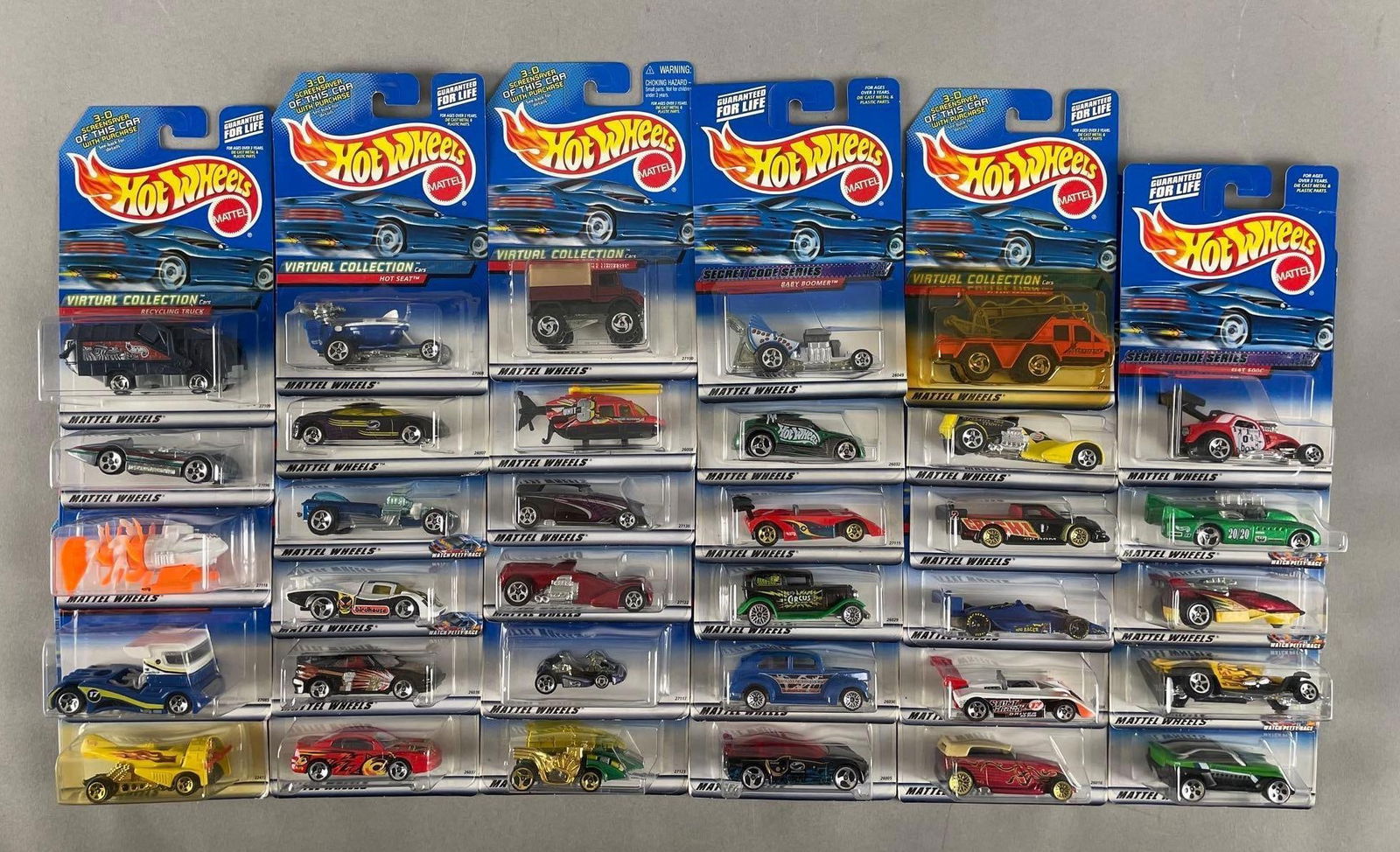 Group of 1999 Mattel Hot Wheels Die-Cast Vehicles: Includes screamin hauler, sol-aire cx4