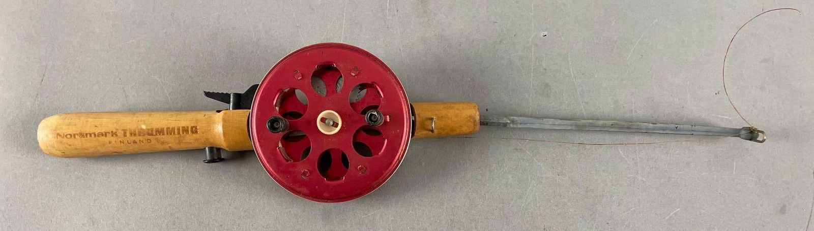 Vintage Normark Thrumming Ice Fishing Rod and Reel: Teho no. 2 jigging rod measures 19"