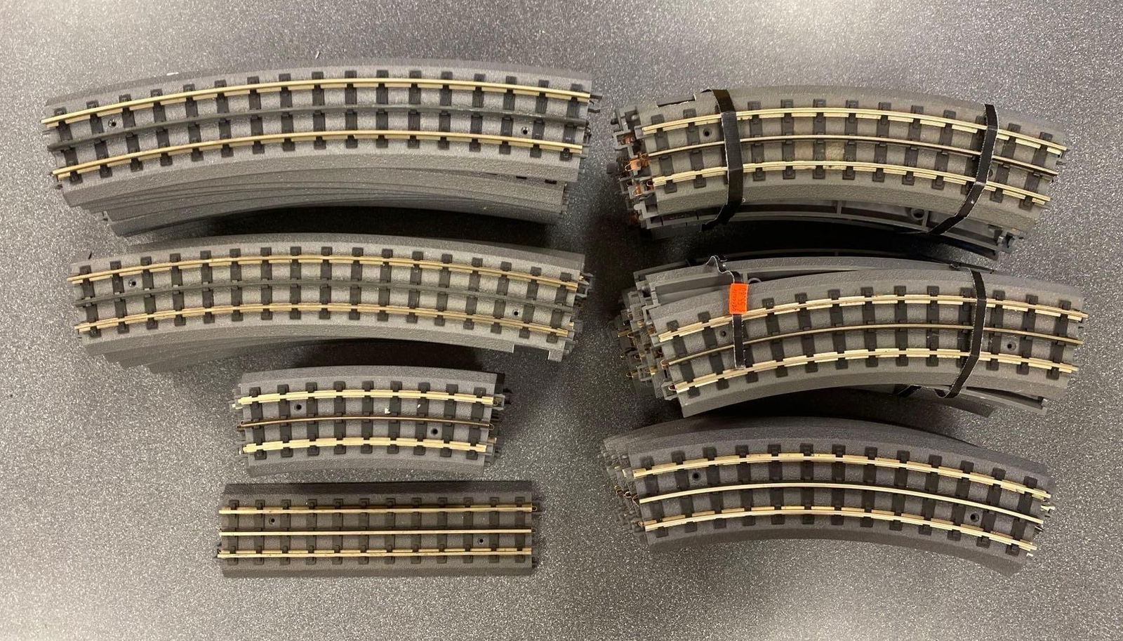 Group of Assorted MTH O Scale Electric Train Tracks: Longest track length measures 13” in length