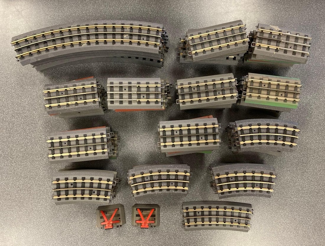 Group of MTH O Scale Electric Trains Track Lengths: Includes curved and straight tracks and 2 stoppers, longest section measures 15” in length