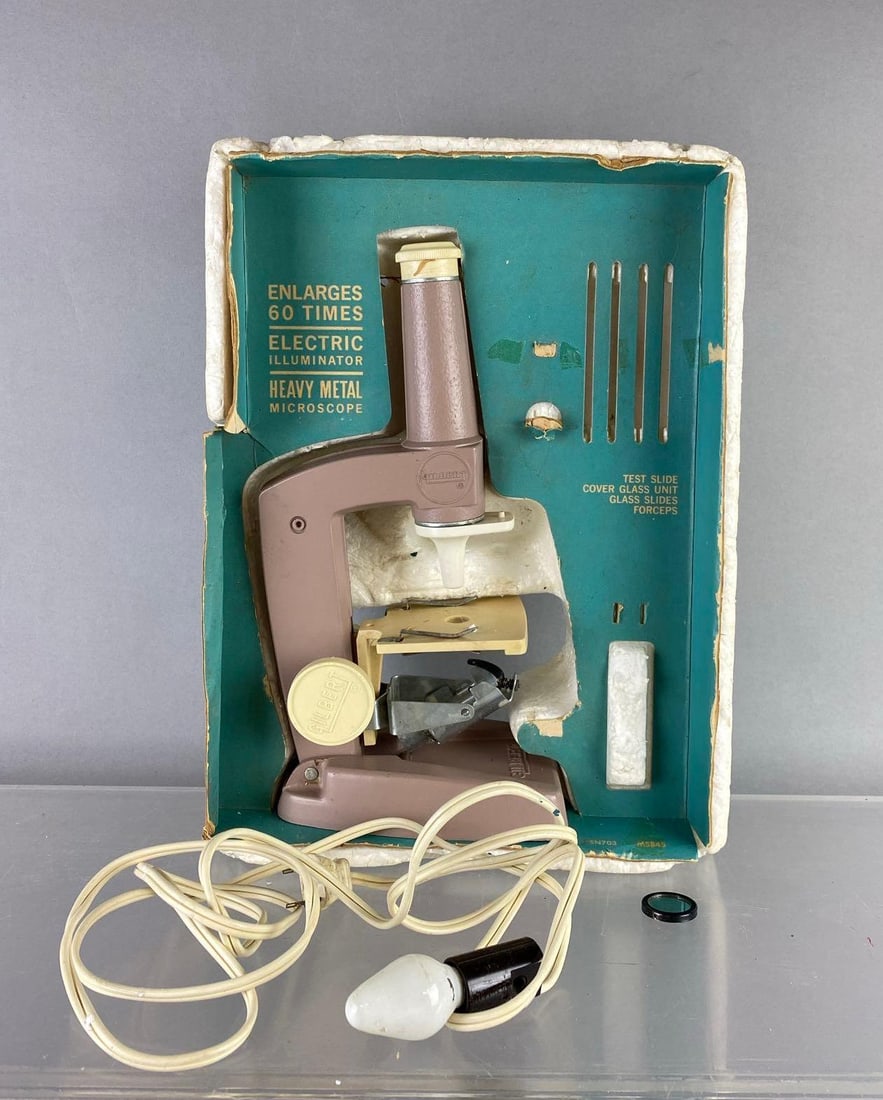 Vintage Gilbert Microscope: Missing accessories. Untested. Packaging measures H 12 x W 3 x L 9 inches.