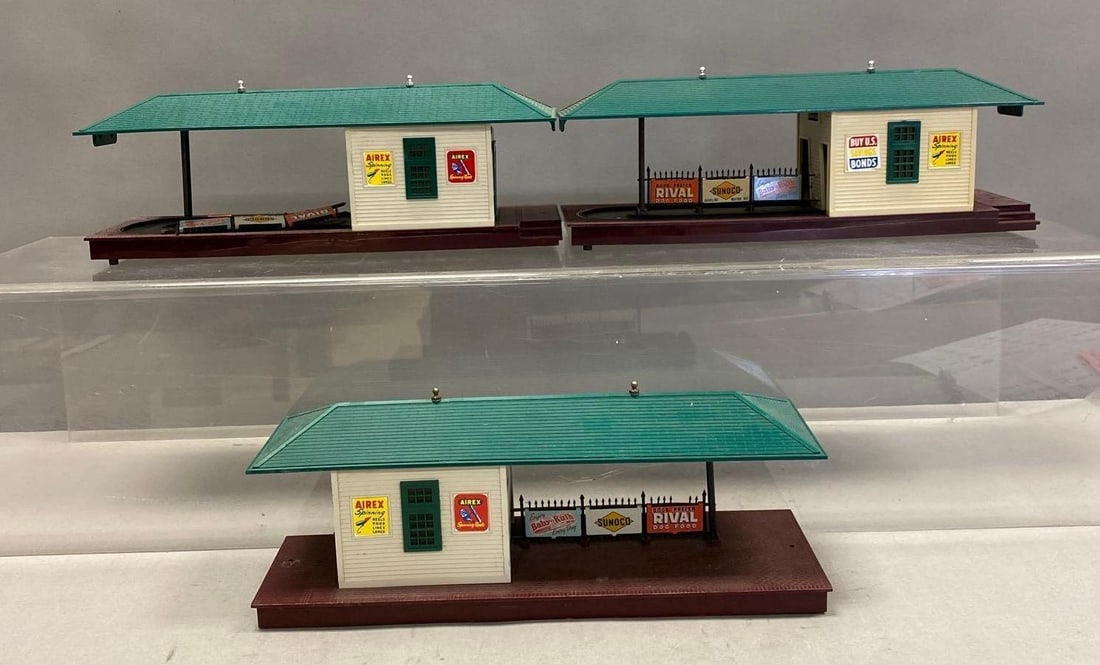 Group of 3 Lionel Trains O Scale Train Station: 1 measures H 5 x W 5 x L 15 inches. Stand not included.
