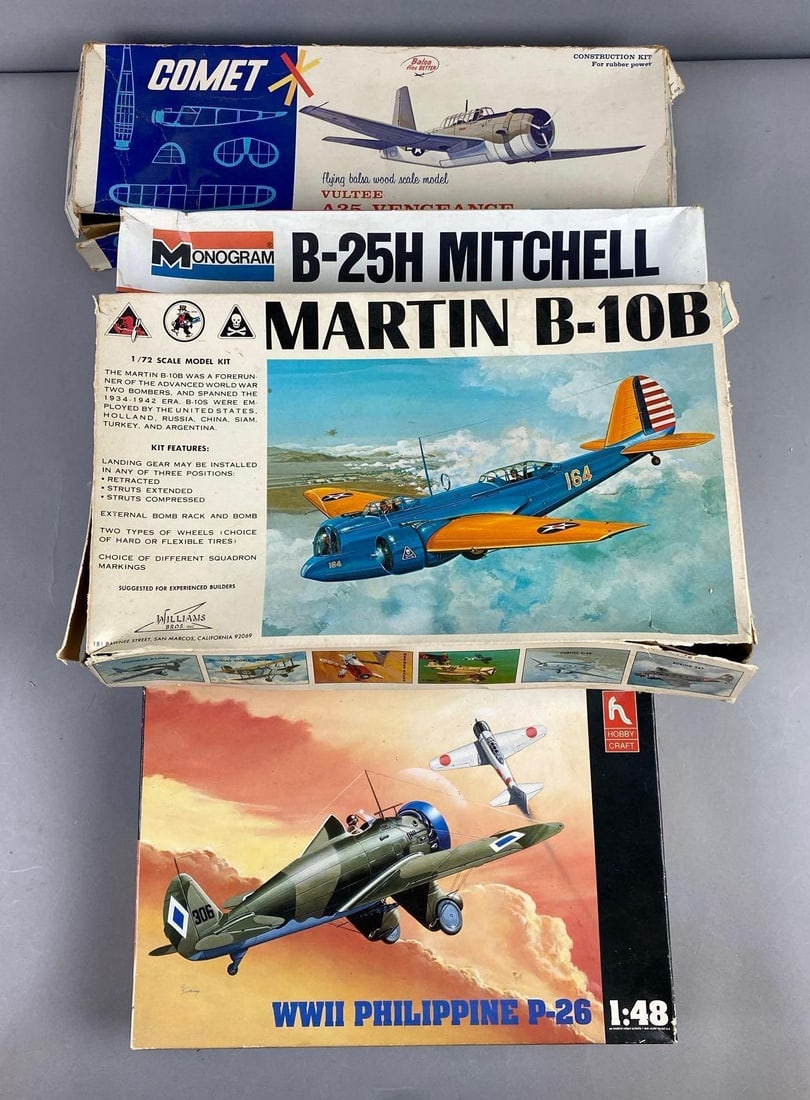 Group of 5 Plane Model Scale Kits: Includes Martin B10B 1/72 kit, B25H Mitchell 1/48 kit and more. Unsure on completion. Largest measures H 3 x W 11 x L 14 inches.