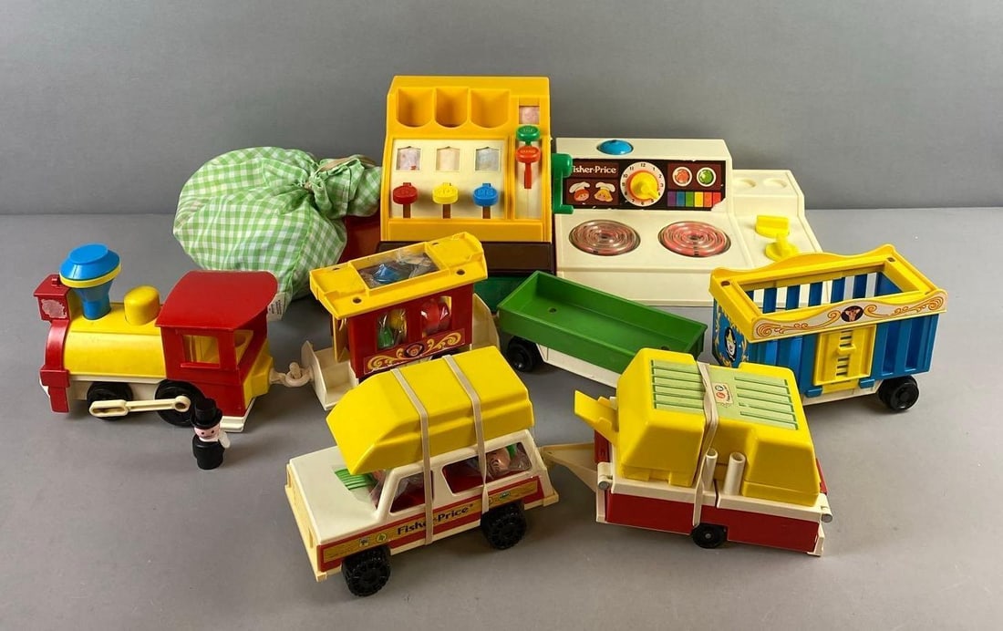 Group of Vintage Fisher Price Toys: Includes train, stovetop, and more. Largest measures item measure H 8 W 7 L 9 inches.