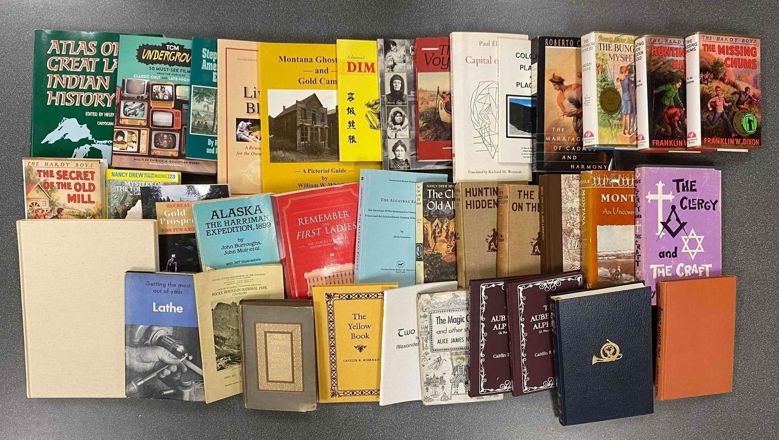 Group of Assorted Books: Includes the clergy, the missing chums and more, largest measures 12” H x 9” W