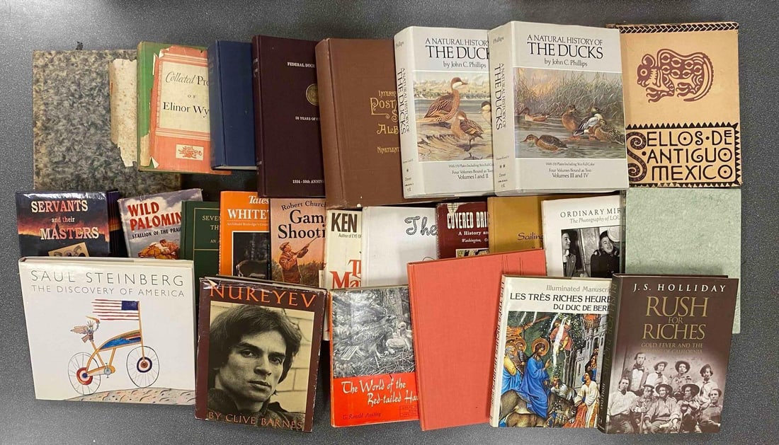 Group of Assorted Books: Includes the discovery of America, Nurvey, the world of the red tailed Hawk, largest measures 12 1/2” H x 10 1/2” w