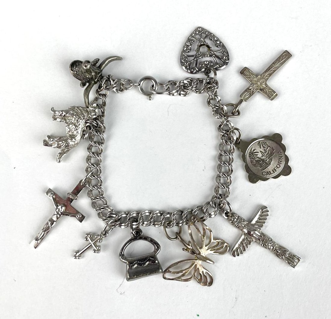 Sterling Silver Charm Bracelet with Sterling Charms: Crucifix les, dog, butterfly, 6 1/4" ,