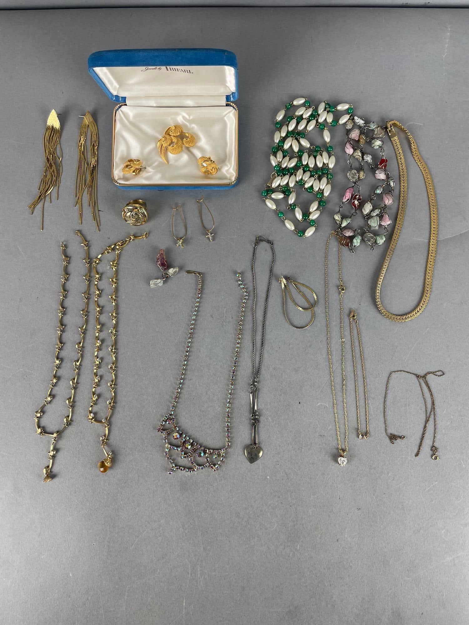 Group of Costume Jewelry: Includes trifari clip on set, necklaces, ring