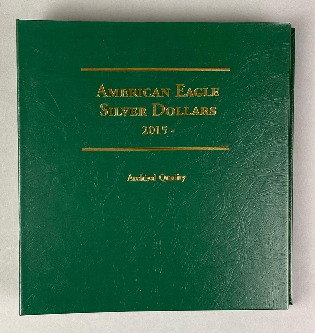 Group of 23 American Eagle Silver Dollars in a Littleton Album (1 of 5)