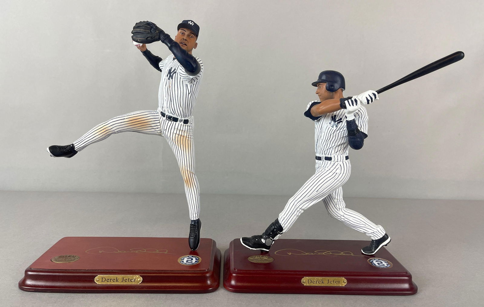 2 - Derek Jeter Danbury Mint Figurine Statues: Derek Jeter Throwing #1946 and Batting #4100, Largest Measures 8 x 5 1/2 x 10 1/2 Inches