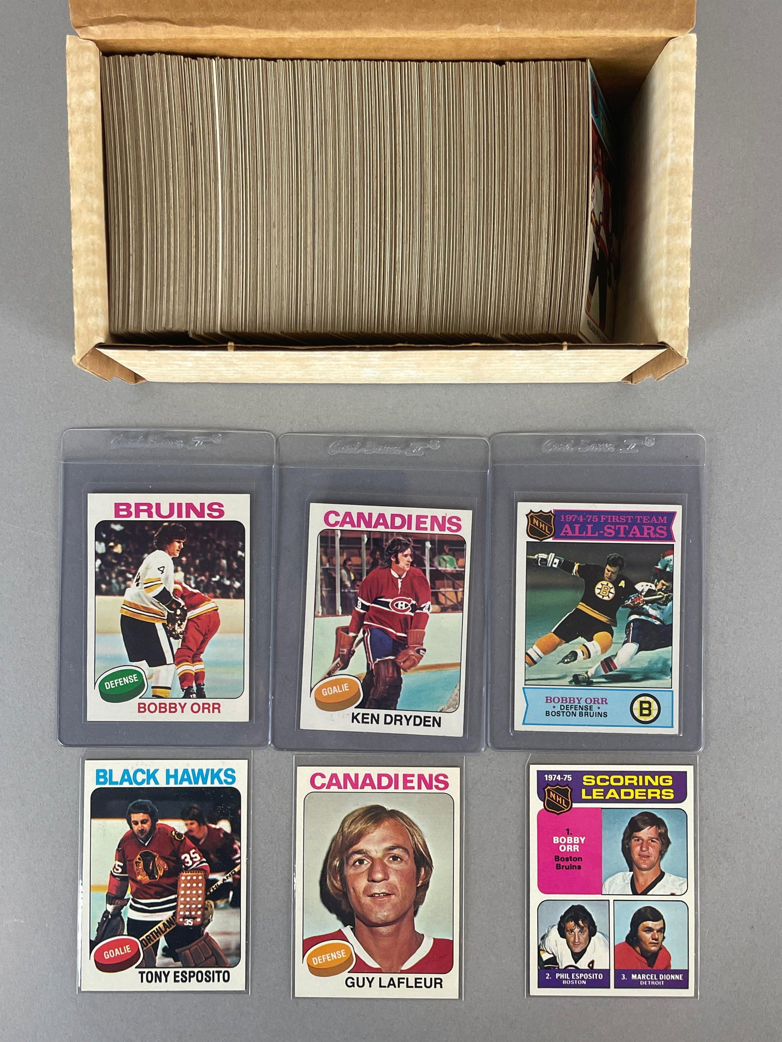 1975 Topps Hockey Complete Set: Conditions vary, EX - NM Nice set, Bobby Orr #100 EXMT, Ken Dryden EX, Bobby Orr #288 EXMT, Guy LaFleur NM, Scoring Leaders EXMT, and More