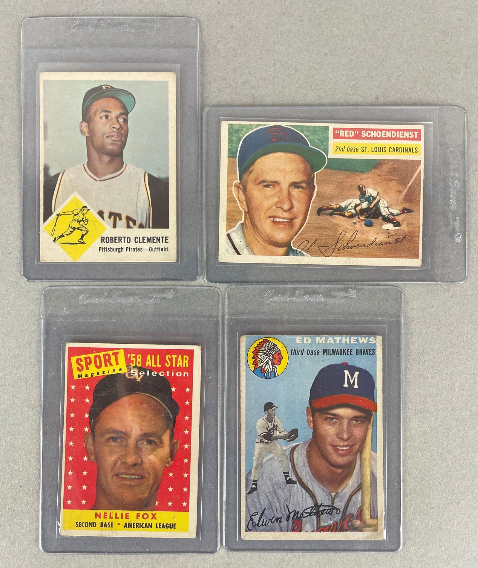 1963 Fleer Roberto Clemente + 3 Other HOFs: 1954 Topps Ed Mathews low, 1956 Topps Red Schoendienst VGEX, 1958 Topps All-Star Nellie Fox VGEX, 1963 Fleer Roberto Clemente VG