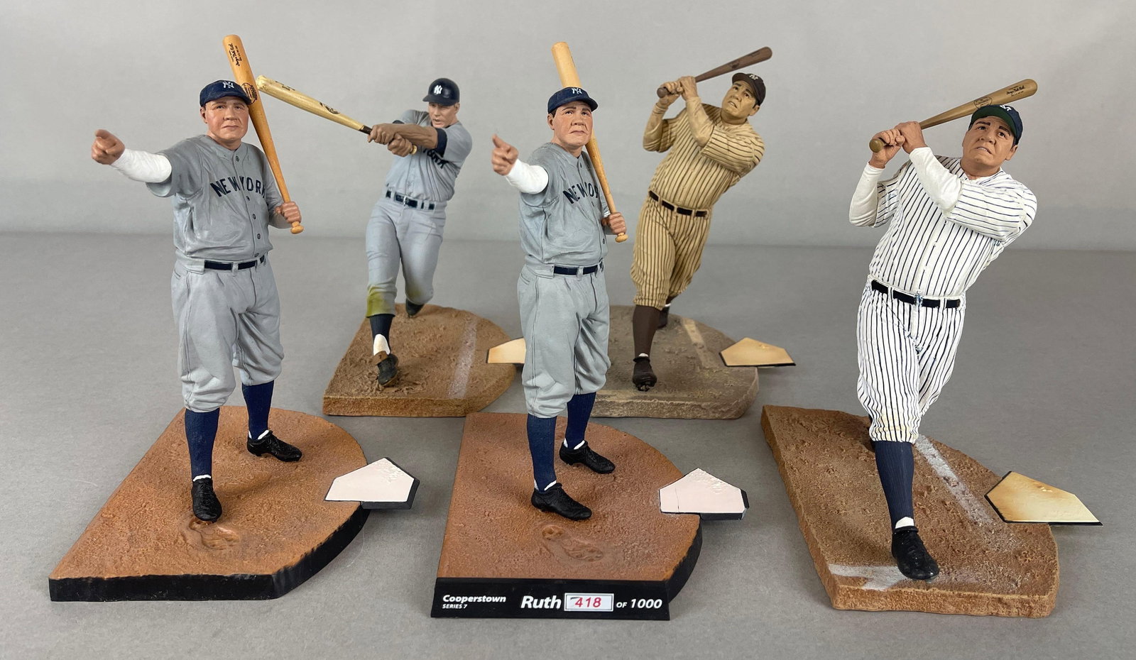 5 - Babe Ruth and Mickey Mantle, McFarlane Figures: 2 - Babe Ruth The Called Shot, 1 - Bronze 418/1000, 2 - 2005 Babe Ruth with 1 - Sepia, 2006 Mickey Mantle, Largest measures 6 x 6 x 8 Inches