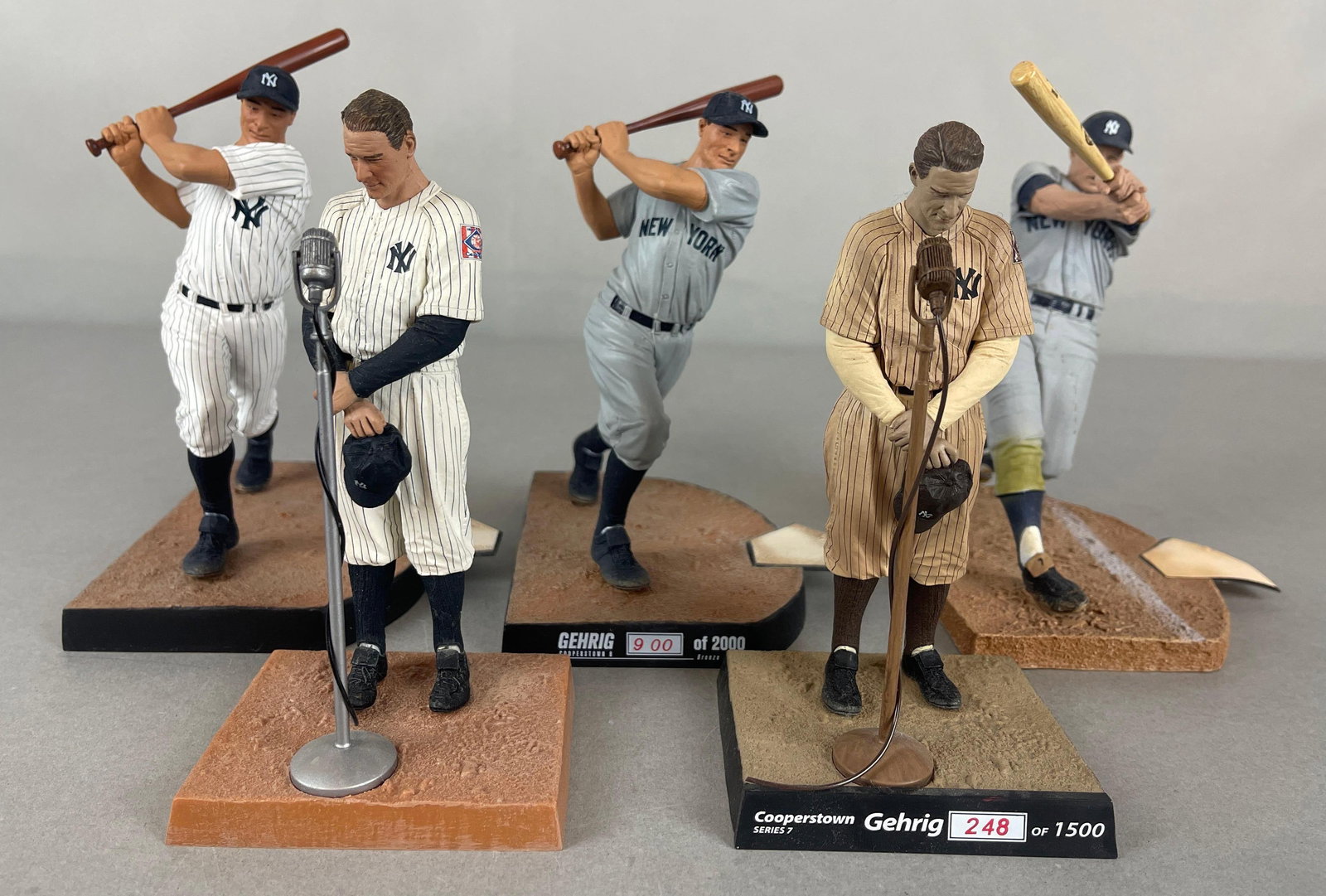 5 - Lou Gehrig and Mickey Mantle McFarlane Figures: 2 - Lou Gehrig Speech 1 - Sepia, 2011 Gehrig with Grey 900/1000 and Pinstripe jersey, 2001 Mickey Mantle, Largest measures 5 x 6 x 7 1/2 Inches