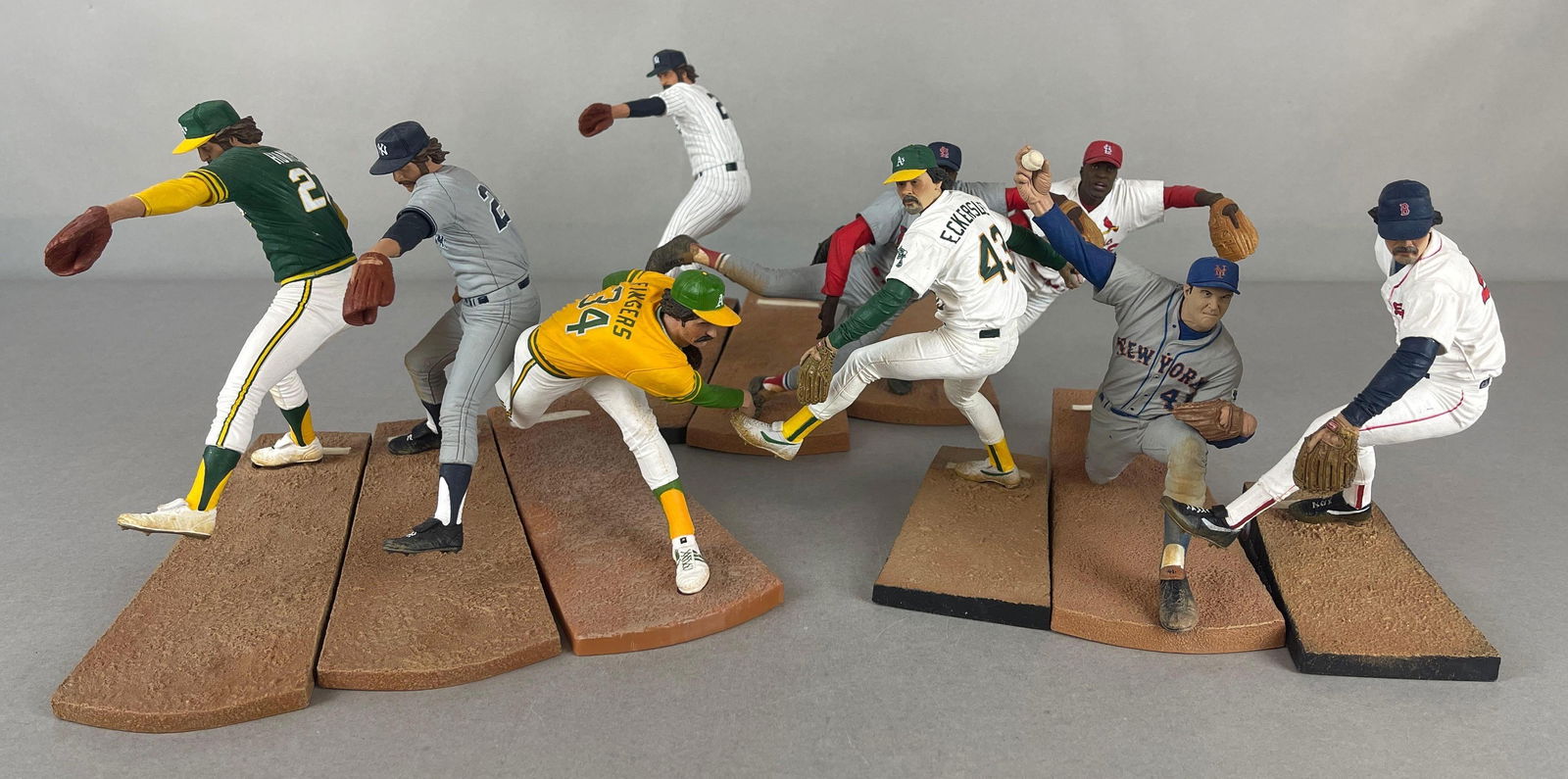 9 - McFarlane Baseball HOF Pitchers Figures: 3 - Jim Hunter Catfish with Bronze level 965/2000, 2 - Bob Gibson Home and Away jersey, 2 - Dennis Eckersley, and Rollie Fingers