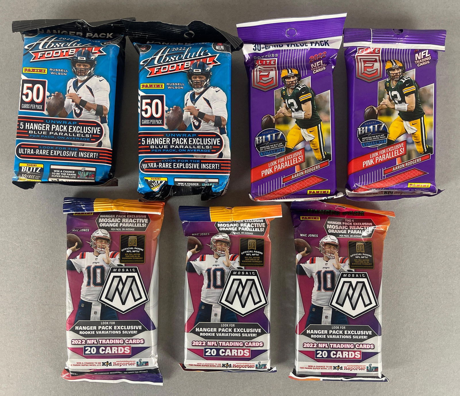 7 - 2022 Absolute, Elite, and Mosaic Football Hanger and Value Packs: 2 - Absolute Hanger - 50 Cards per pack, 2 - Elite - 30 Cards per pack, 3 - Mosaic 20 - Card per pack