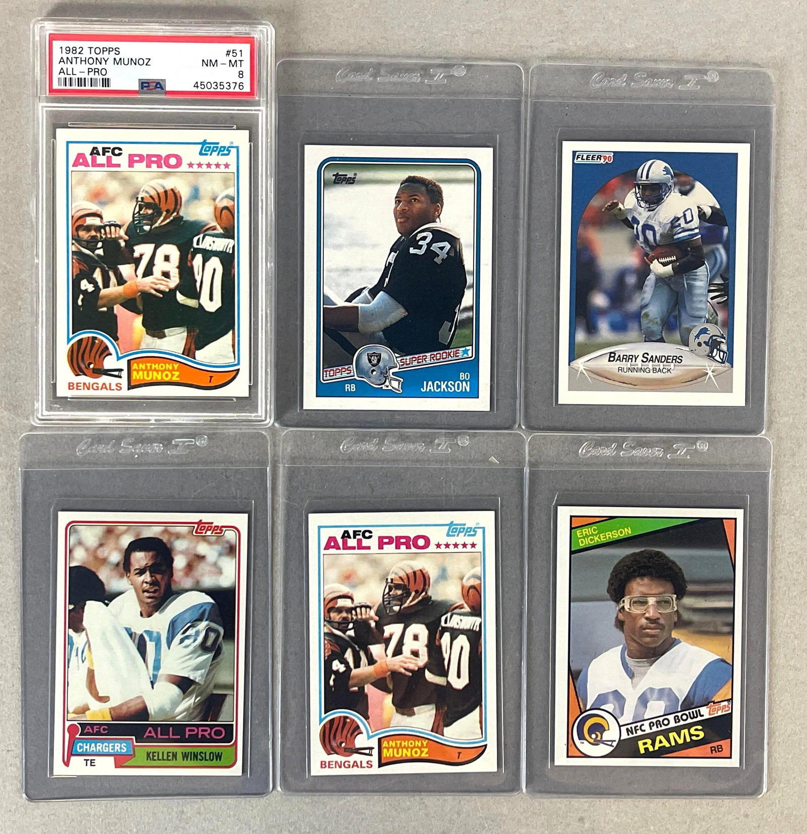 1982 Topps Anthony Munoz #51 PSA 8 + 5 - HOF and Star Rookies: Condition vary, NM - Mint, 1988 Topps Bo Jackson #327, 1981 Topps Kellen Winslow #150, 1982 Topps Anthony Munoz #51, 1984 Topps Eric Dickerson #280, 1990 Fleer Emmitt Smith #284