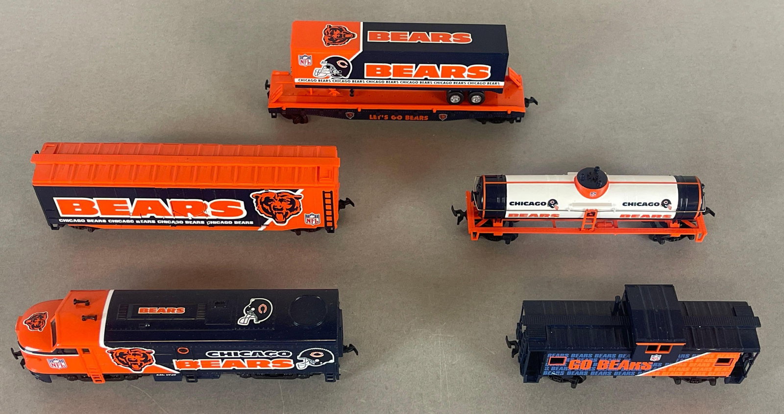Group of 5 Chicago Bears HO Scale Express Train: Includes Engine, Tanker, Semi Flatbed with Trailer, Cargo Hull, and Caboose, Measures 8 x 1 1/2 x 3 Inches