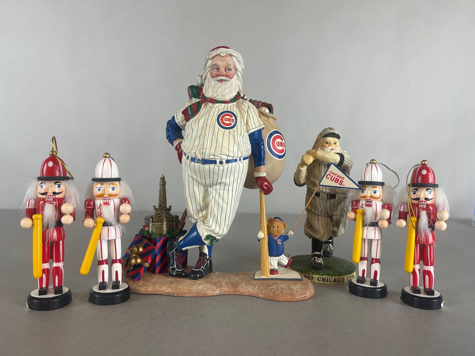 Chicago Cubs Santa and Nutcracker Figures: 4 - Nutcrackers and 2 - Santas, some repairs, Largest Measures 9 x 3 x 9 1/2 Inches