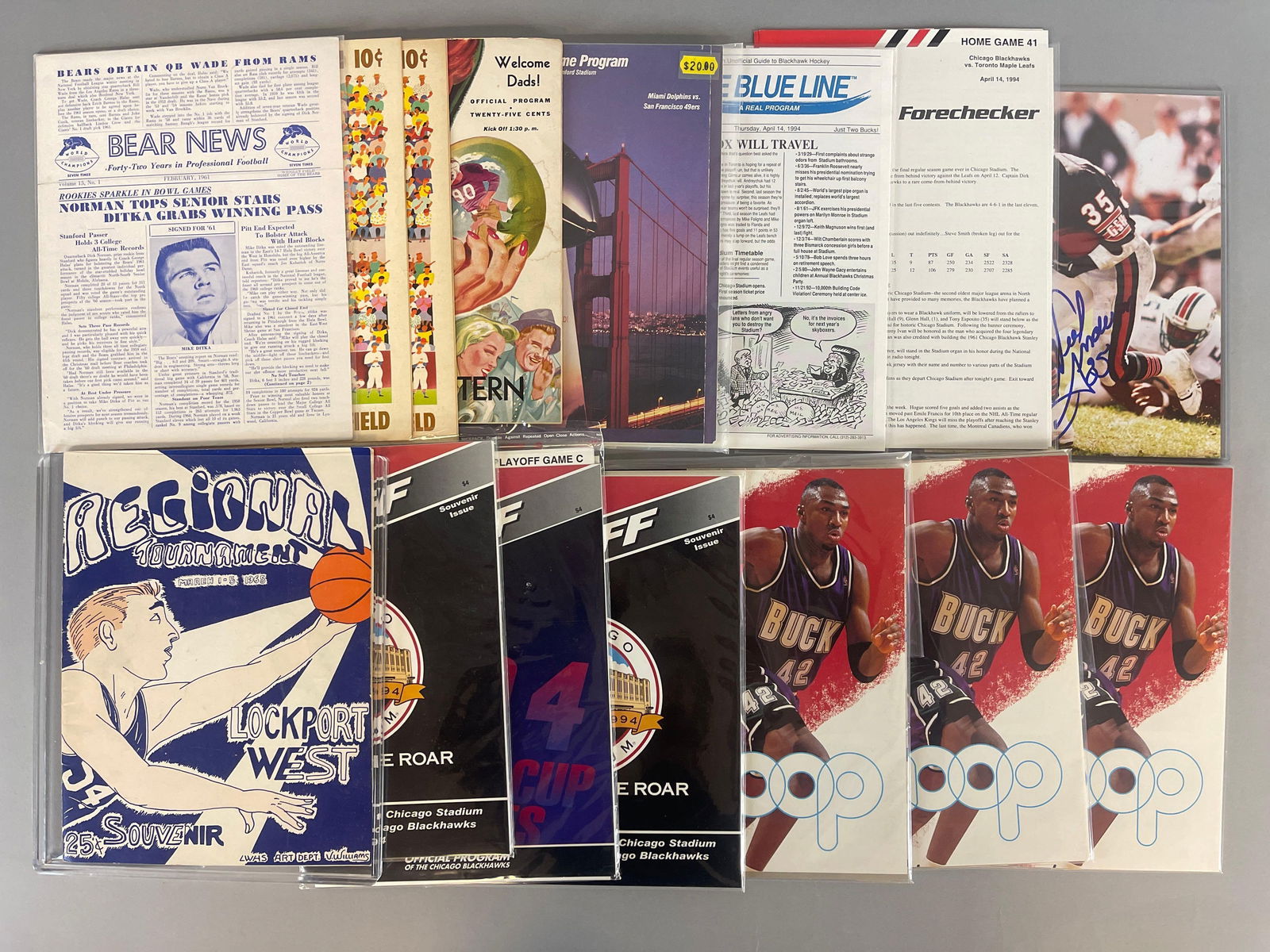 Large Group of Chicago Cubs, Bears, Blackhawks, and More Memorabilia: 1961 Bear News - 1st photo of Mike Ditka, 2 - 1955 Chicago Cubs programs, Neal Anderson signed photo, 3 - 1996 70th Game win for Bulls Program, 3 - 1994 Chicago Blackhawks Programs, and More
