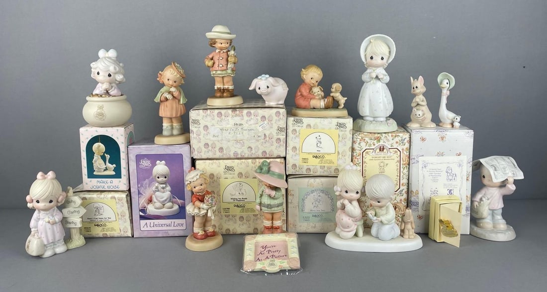 Group of Enesco Precious Moments Figurines: Some in original packaging