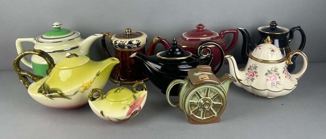 Group of Vintage Teapots: Includes frankoma, hall's, hull has broken lid, green and white measures 7 1/2" x 10 1/2" x 6"