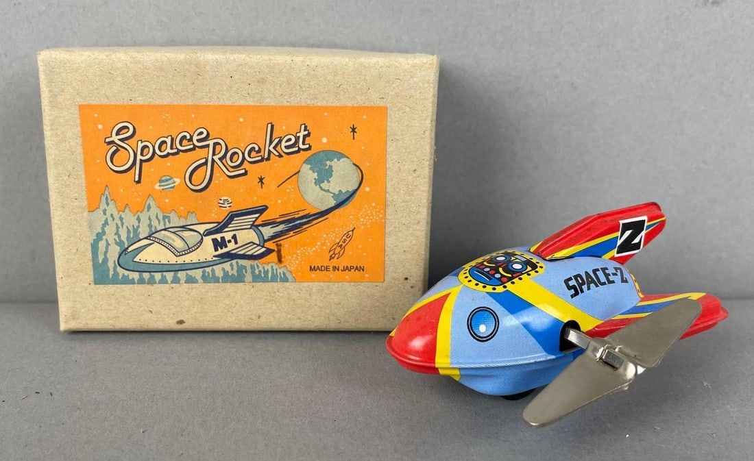 Yonezawa Japan Tin Litho Wind-Up Space Rocket: Working condition, original box measures 2 1/2" x 3 1/2" x 1 1/2"