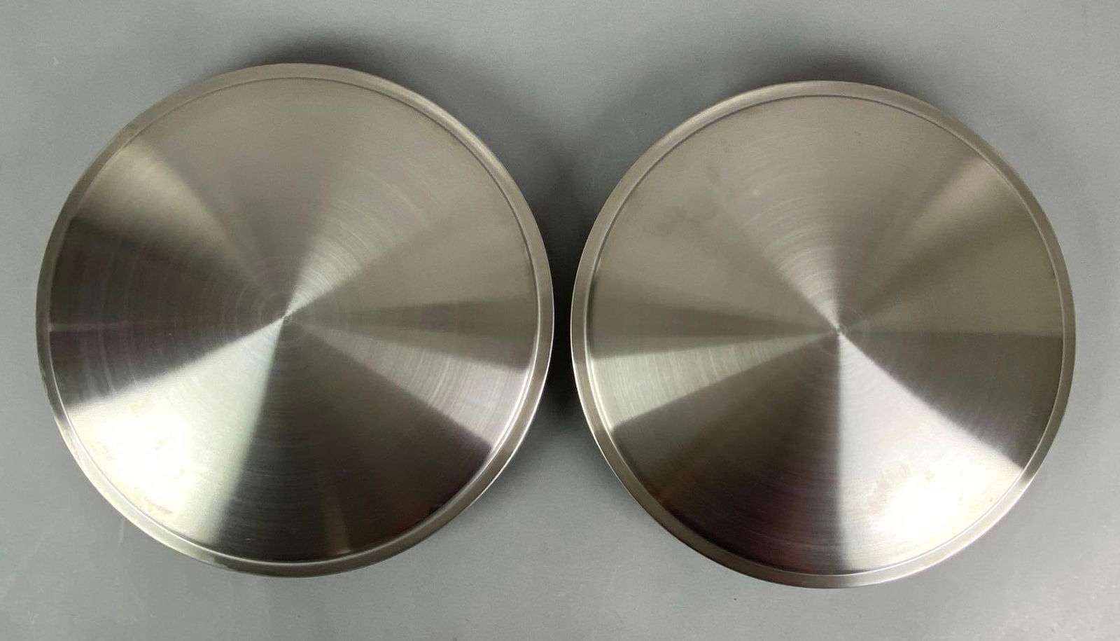 Group of 2 No. 4900 Racing Disc Wheel Covers: Each measures 15 1/2” in diameter