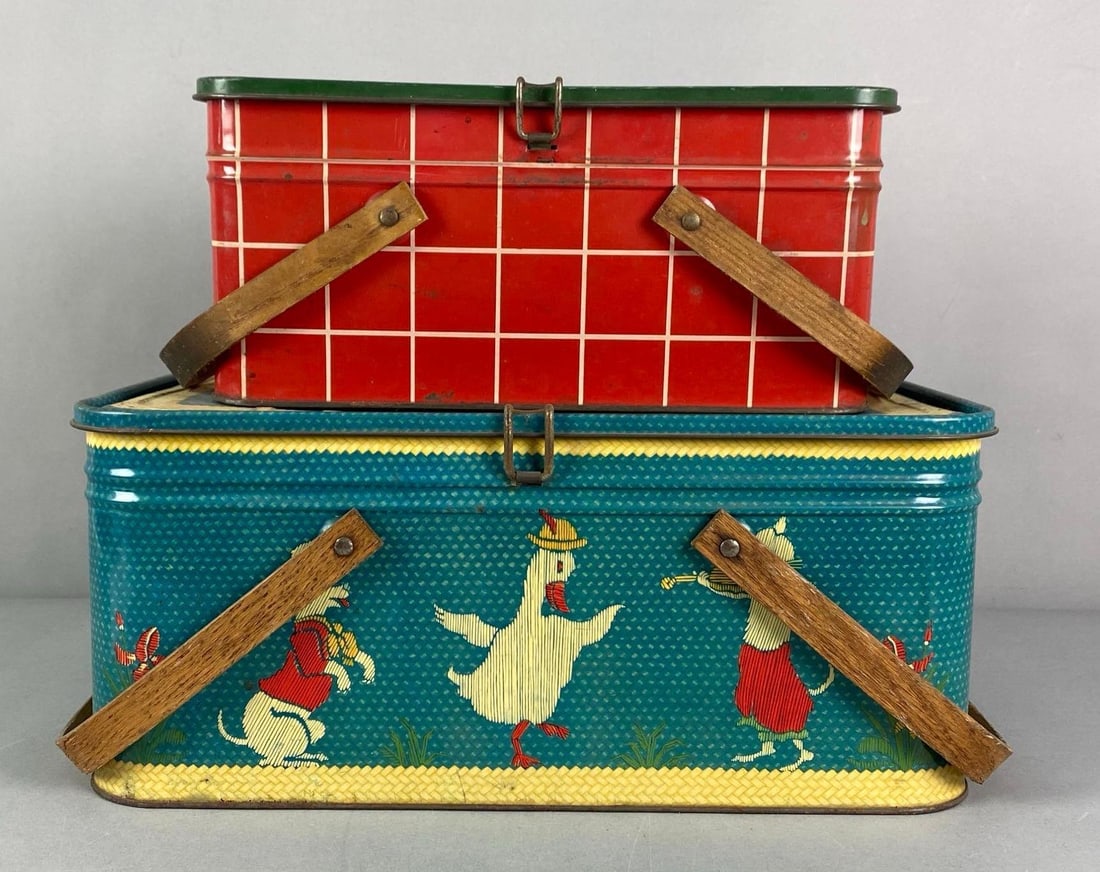 Group of 2 Vintage Tin-Litho Picnic Baskets: Some rust and paint scratches throughout, largest measures 7” H x 17” W x 11” D