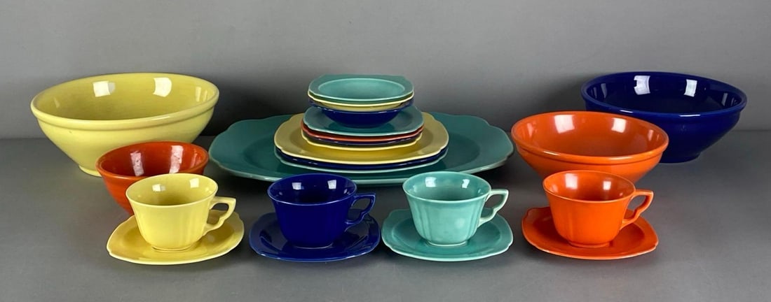 Group of Caliente Porcelain Dishes: Includes mixing bowls, teacups, saucers and more, largest measures 3 1/2” H x 9 1/2” W