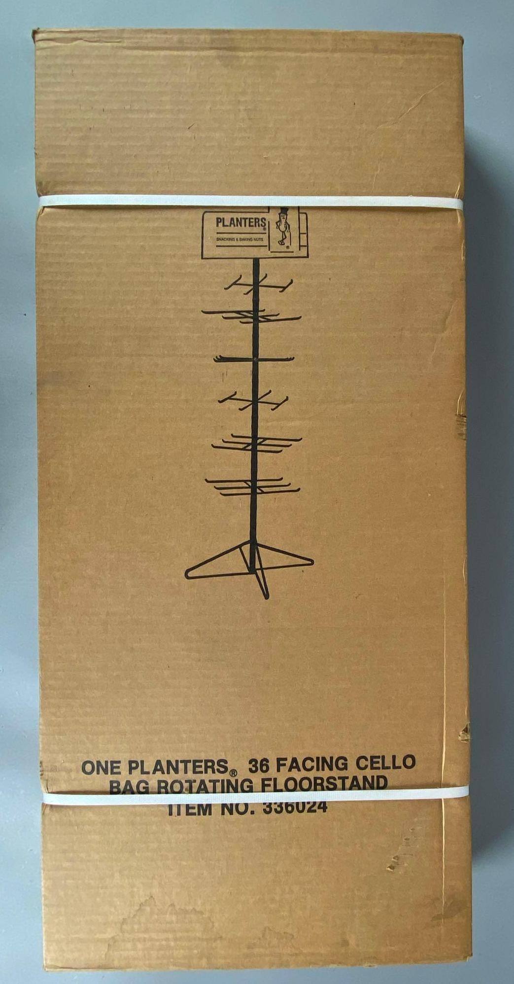 Planters Peanuts 36 Facing Cello Bag Rotating Advertising Floor Stand: Sealed in original box, box measures 32” H x 14 1/2” W x 4 1/2” D