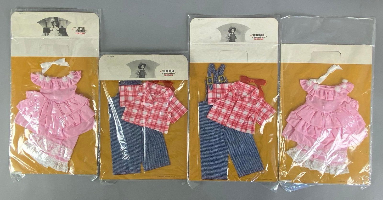 Group of 4 1974 Ideal Fashion Dolls Outfits: Inclufed Little Colonel and Rebecca of Sunnybrook farms, largest measures 17 1/4” H x 9 1/2” W