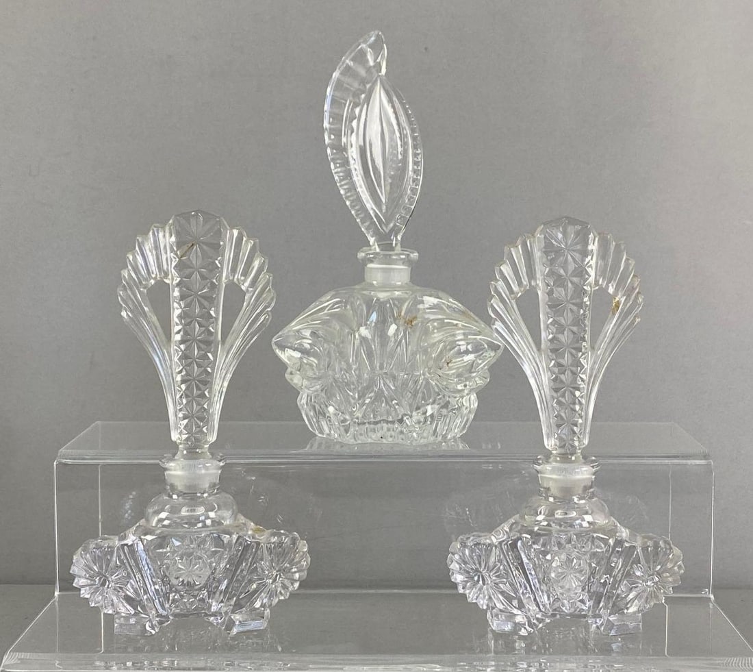 Group of 3 Pressed Glass Perfume Bottles: Largest measures 8” H x 4 1/2” W x 3” D